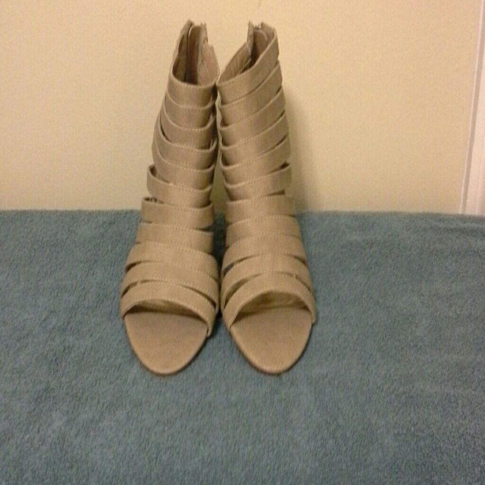 Strappy sandel with zipper in back (never worn)